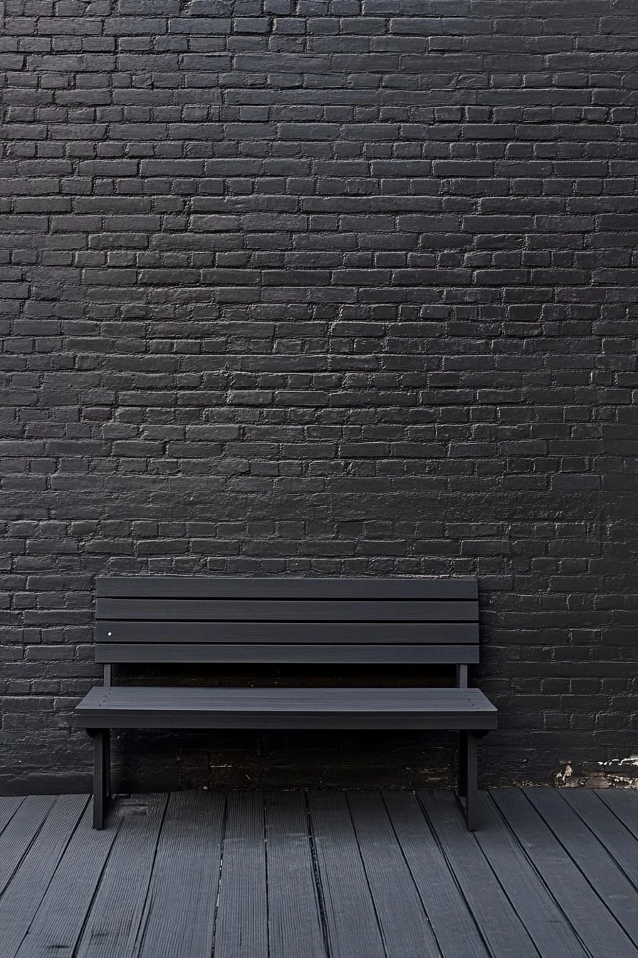 Black Painted Brick Wall and Decking