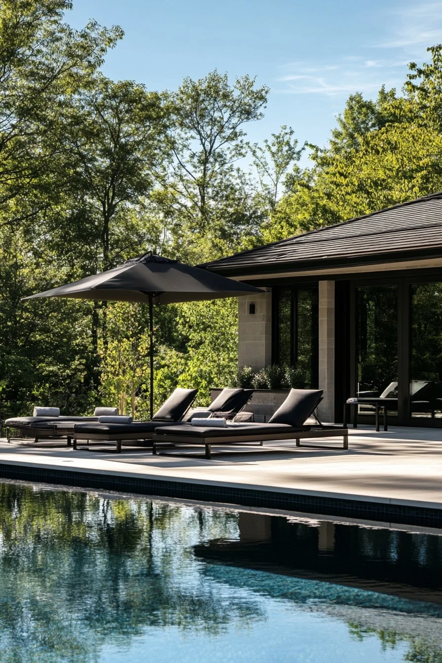 Black Poolside Deck with Lounge Chairs