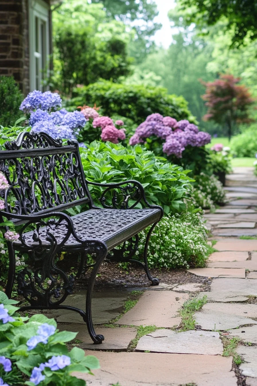 Vintage Iron Bench with Flowering Shrubs